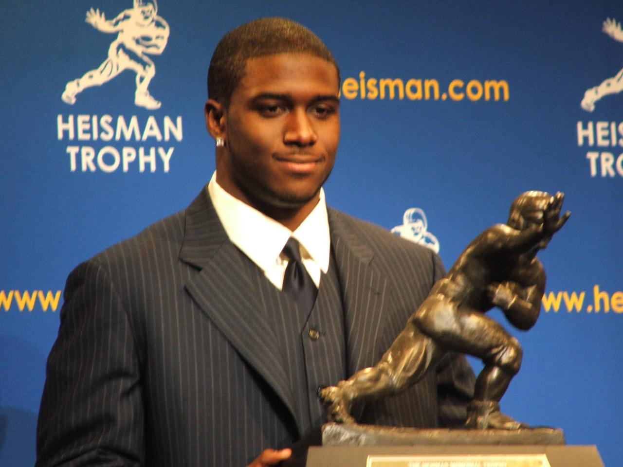 Why did reggie bush get his heisman take